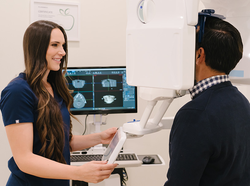 dental implant doctor and patient